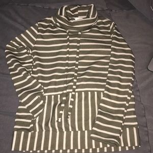 Green and creme sweater shirt.